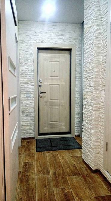 Квартирная дверь с отделкой белым МДФ 